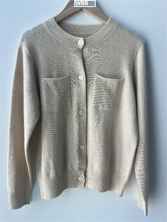 Cardigan du pull à bouton en tricot de poche pour femmes